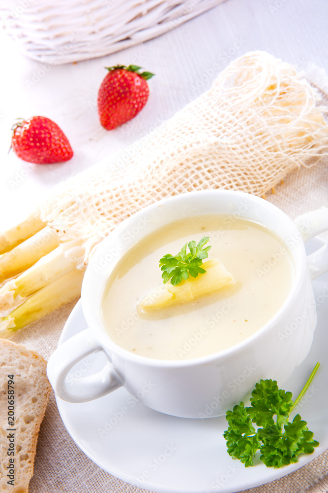 asparagus cream soup with capers and fresh baguette asparagus cream soup with capers and fresh baguette