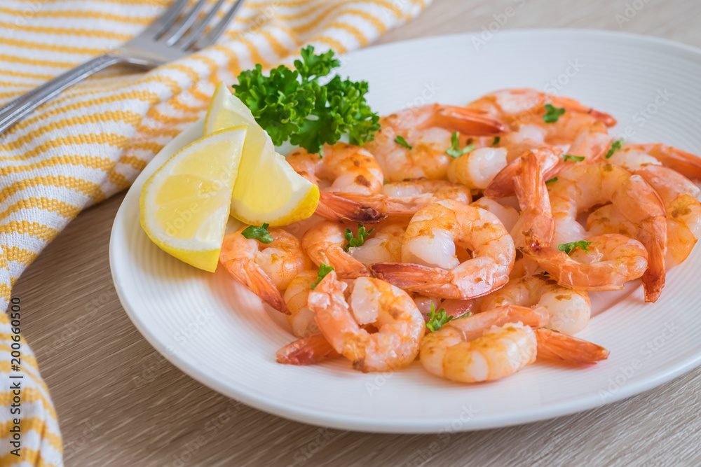 Fried shrimp with lemon on plate Fried shrimp with lemon on plate