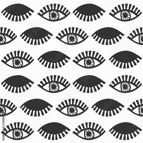 Abstract black blinking feminine eyes with lashes pattern on white background