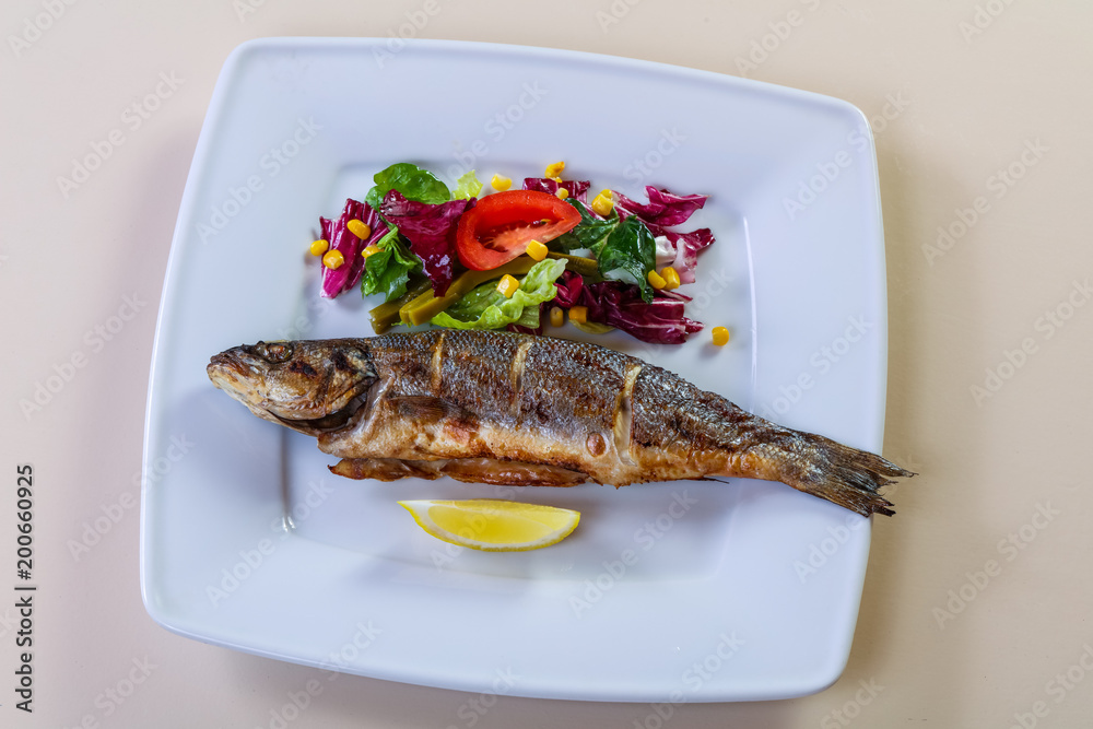 Grilled seabass with lemon