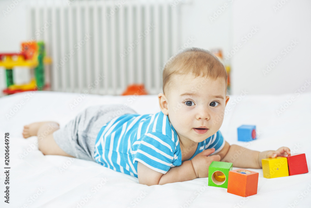 Baby boy playing at home Baby boy playing at home