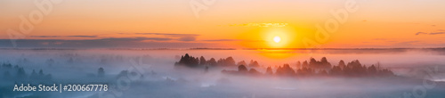 Fototapeta Naklejka Na Ścianę i Meble -  Amazing Sunrise Over Misty Landscape. Scenic View Of Foggy Morning