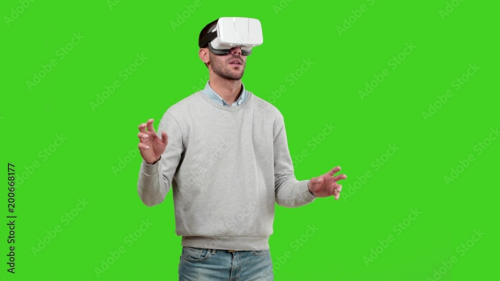 Astonished guy using a virtual glasses Astonished guy using a virtual glasses