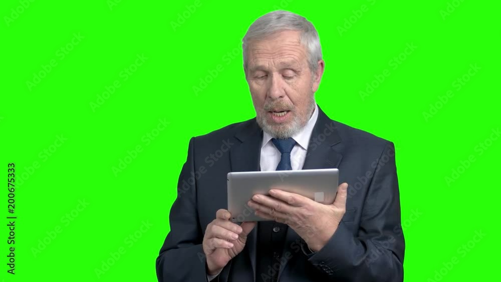 Elderly entrepreneur talking using pc tablet. Happy senior man talking with children using digital tablet, Alpha Channel background. Elderly entrepreneur talking using pc tablet. Happy senior man talking with children using digital tablet, Alpha Channel background.