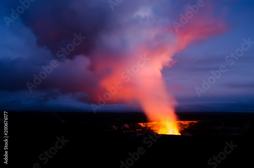 Kilauea volcano ash cloud glow at sunset.