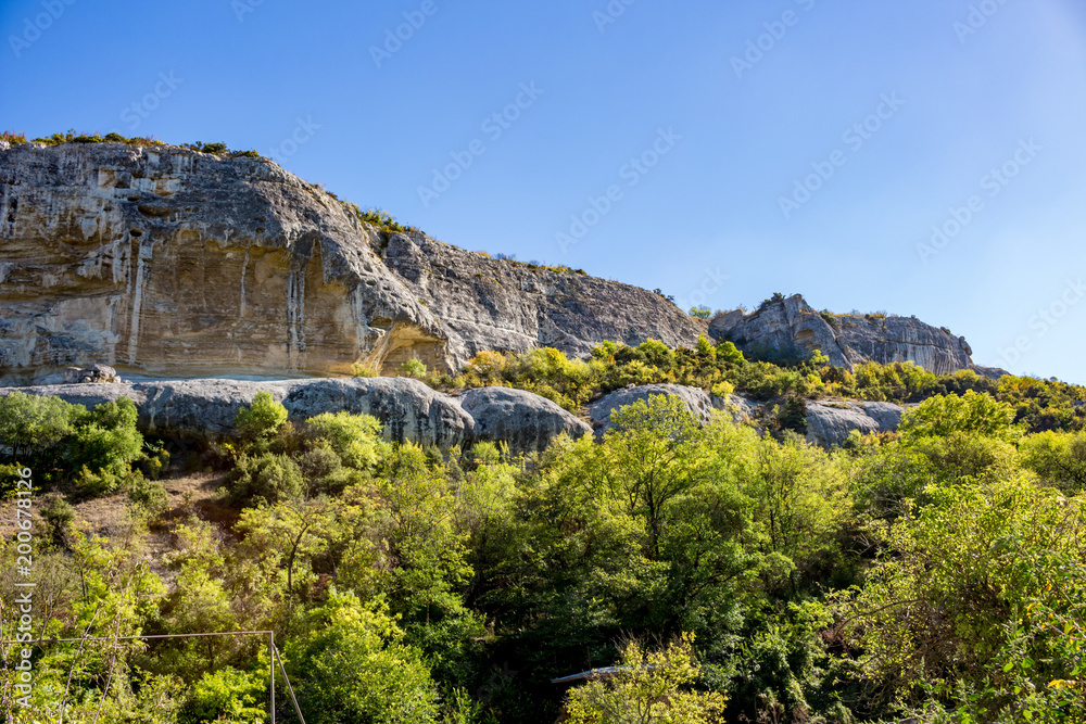 Bakhchisarai Cave Monastery (The Assumption Monastery of the Caves) in Crimea, near Bakhchysarai. Herd monastic goats
