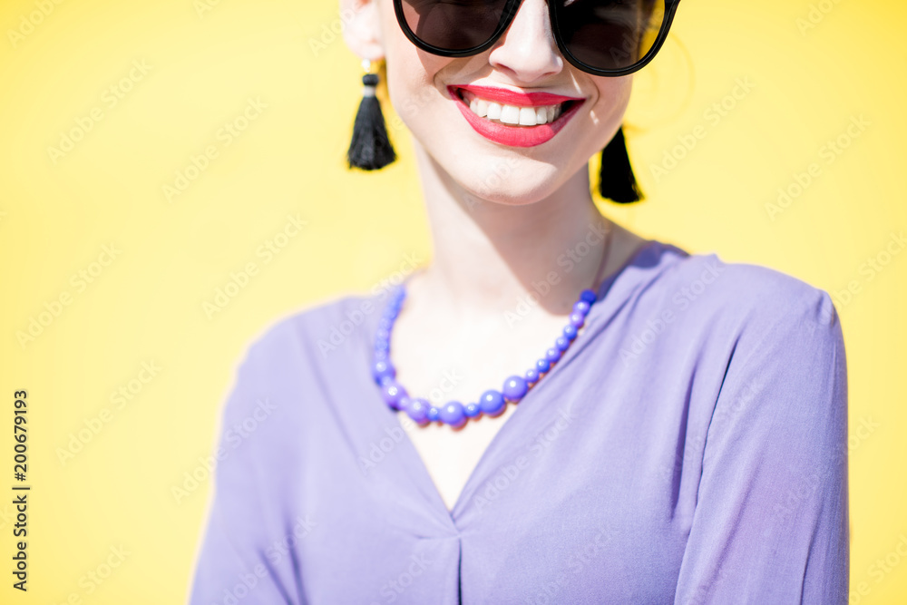 Woman portrait on the yellow background outdoors Woman portrait on the yellow background outdoors