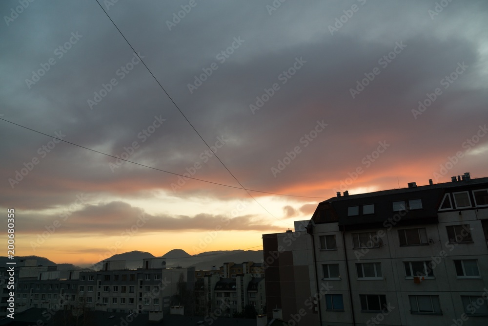 Sunset and sunrise with dramatic colorful clouds. Slovakia