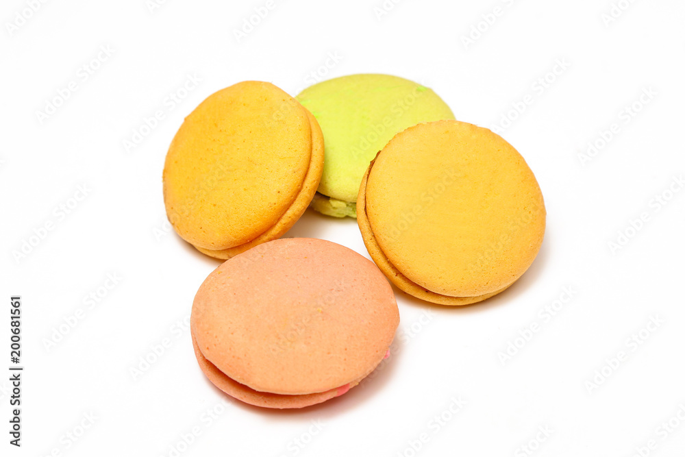 Delicious four multicolored macaroon isolated on white background Delicious four multicolored macaroon isolated on white background