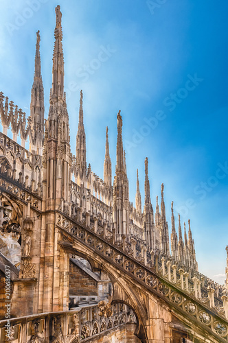 Spiers and statues on the gothic Cathedral of Milan, Italy