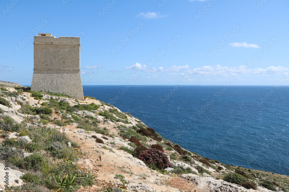 Tal-Ħamrija Coastal Tower at the Mediterranean Sea in Malta
