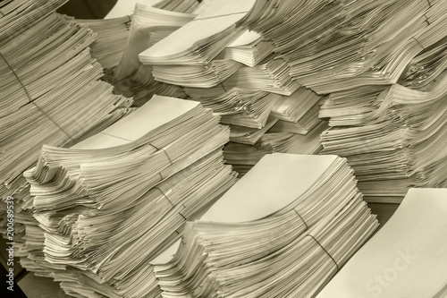 pile of paper documents in the office