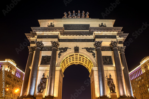 tourist attraction of night Moscow, triumphal arch in the light of night lights