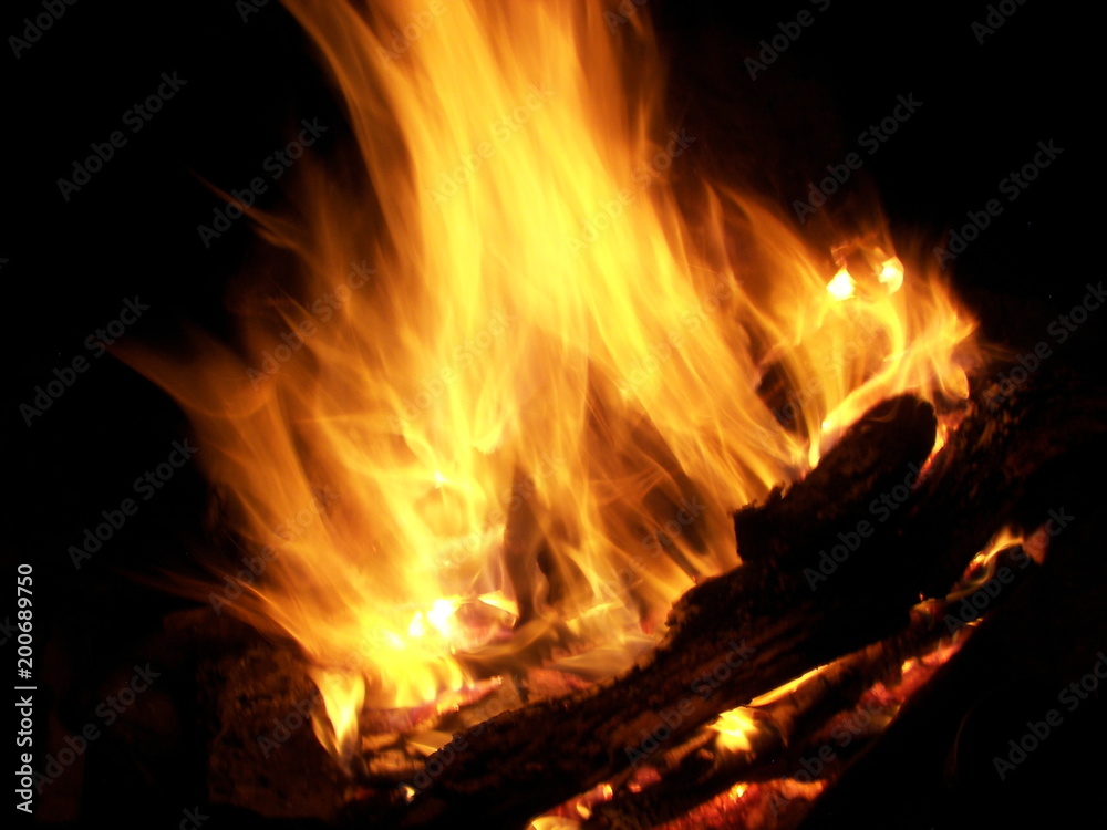 Sparks and flares of a night fire forest Sparks and flares of a night fire forest