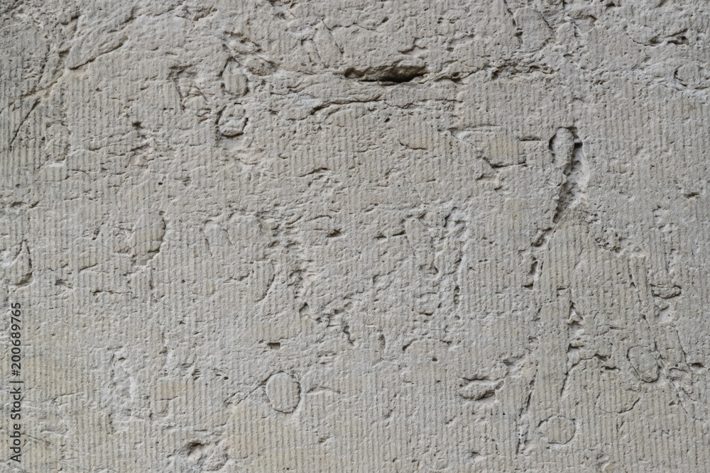 Background texture from gray limestone patterns.