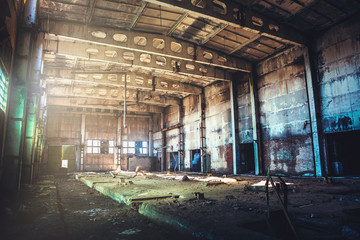 Tableau sur toile  Abandoned ruined industrial factory building, corridor view with perspective, ruins and demolition concept  © DedMityay