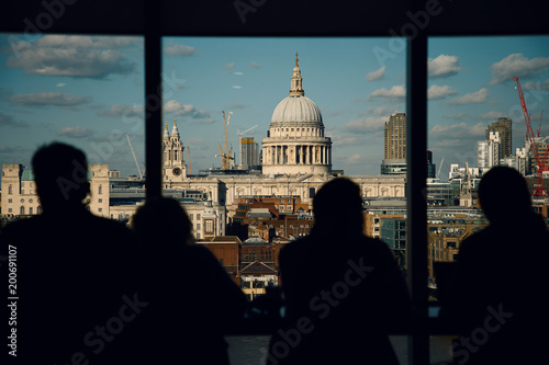 London St. Paul`s Cathedral, view from Tate Modern with Silhouetted unnamed people