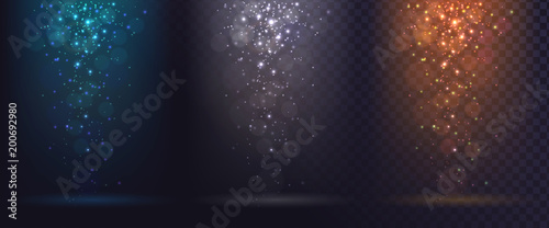 Set of rays of light and falling spangles or snow, blue white and gold, shimmering dust