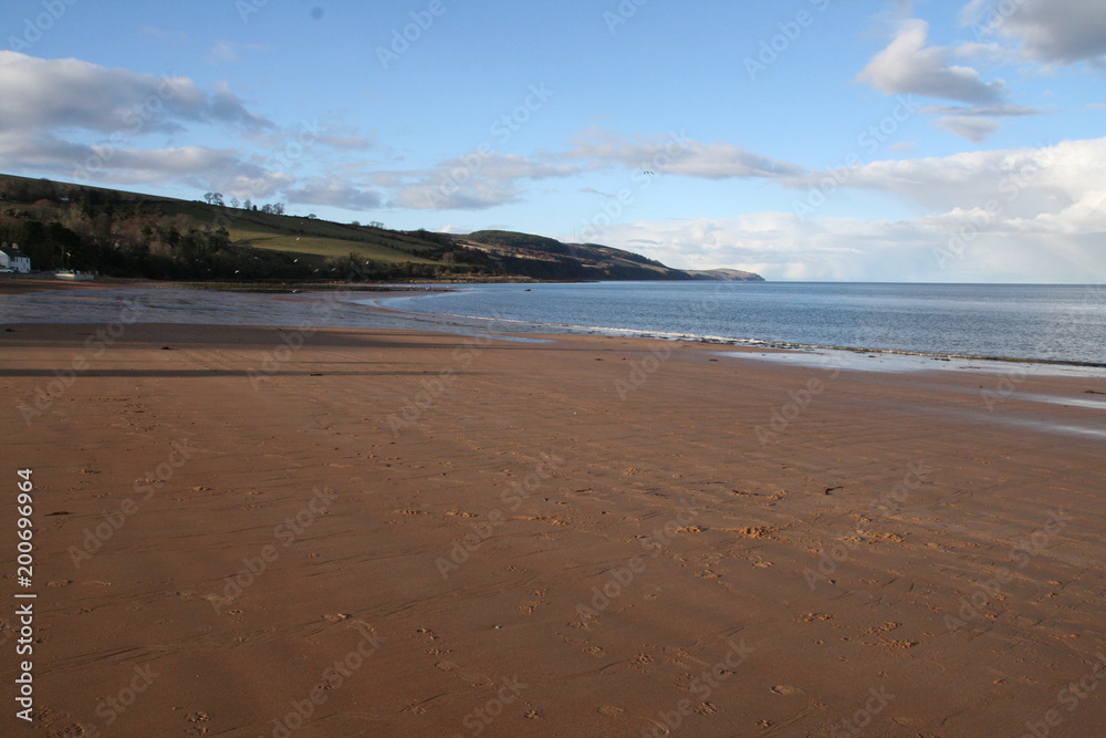 Late afternoon walk on Rosemarkie Beach, Black Isle, Highlands, Scotland Late afternoon walk on Rosemarkie Beach, Black Isle, Highlands, Scotland