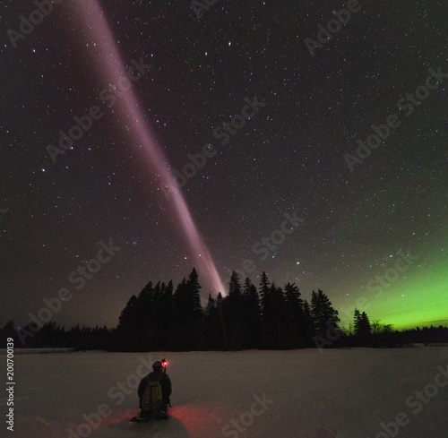 Bilde på lerret The Northern Lights and atmospheric phenomenon 'STEVE' which appears as a purple and green light ribbon in the sky