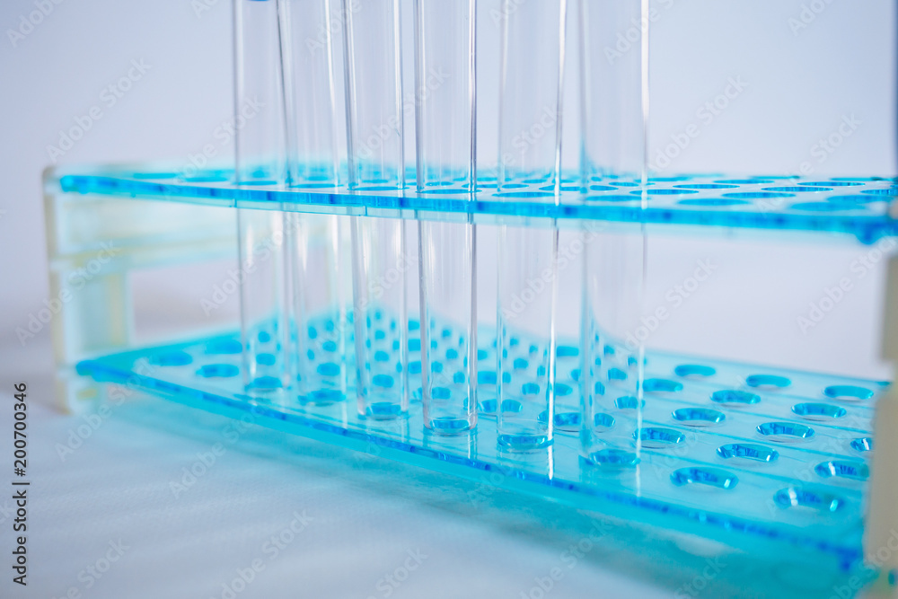 Obraz premium Laboratory pipette, science laboratory, doctor, science research concept, test tube on blue background