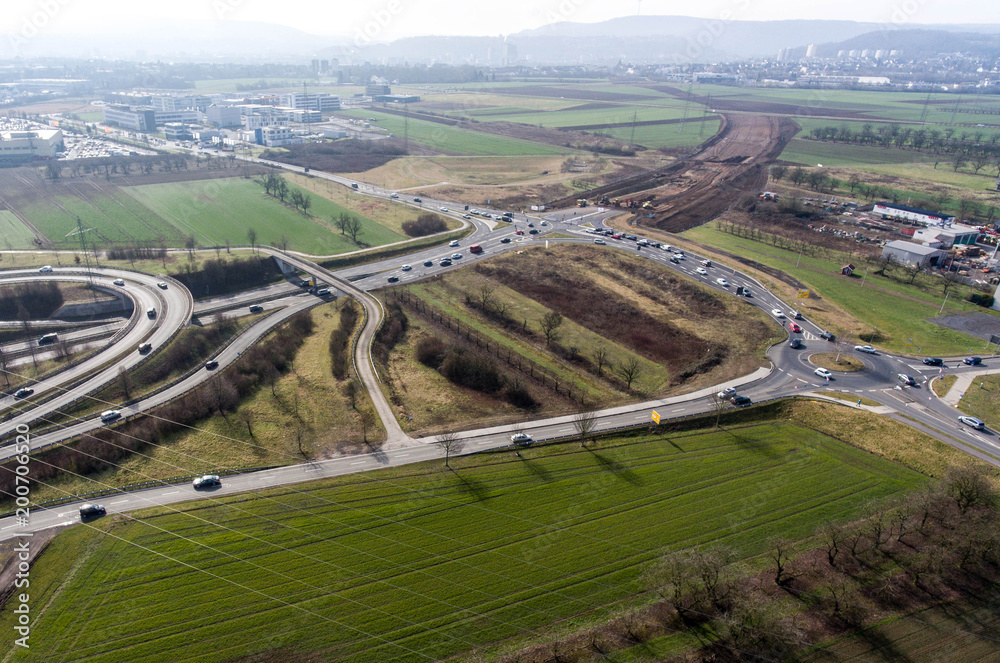 Aerial view of a highway intersection with a clover-leaf interchange Germany Koblenz Aerial view of a highway intersection with a clover-leaf interchange Germany Koblenz