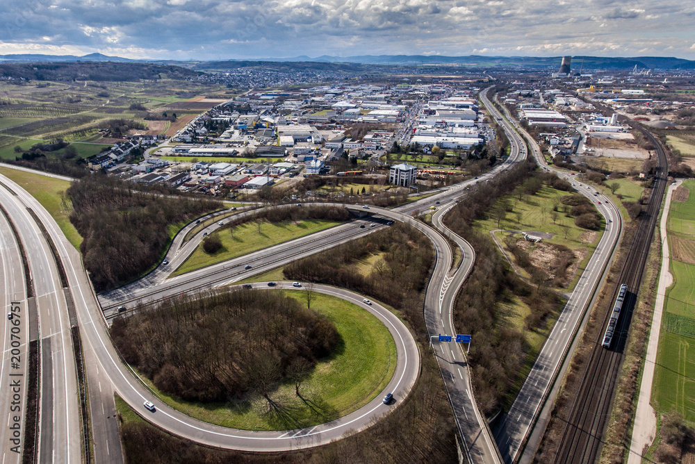 Aerial view of a highway intersection with a clover-leaf interchange Germany Koblenz