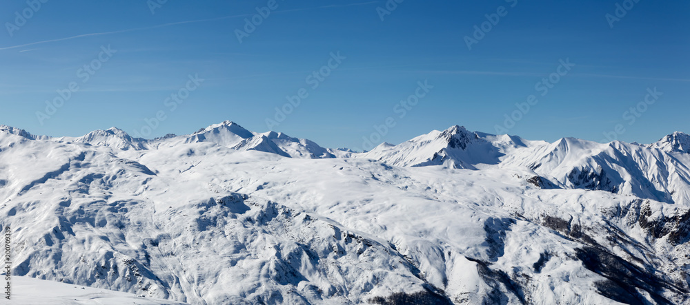 Landscape French Alps after a snowfall, Haute Savoy, France. White mountain and blue sky.