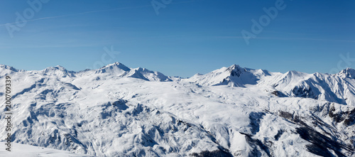 Landscape French Alps after a snowfall  Haute Savoy  France. White mountain and blue sky.