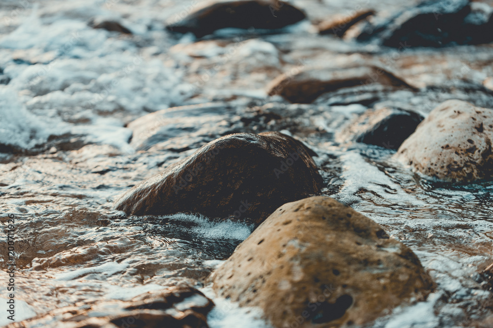 Beautiful rocky shore of the beach with waves crashing. Lazy beach, Koh Rong Sanloem. Vintage style filter Beautiful rocky shore of the beach with waves crashing. Lazy beach, Koh Rong Sanloem. Vintage style filter