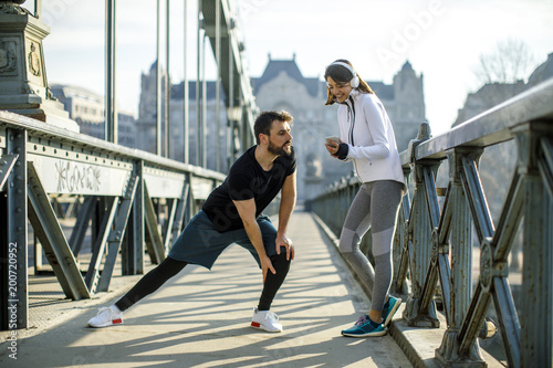 Young couple have training in urban enviroment