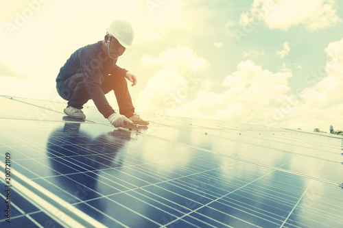 engineer team working on replacement solar panel in solar power plant;engineer and electrician team swapping and install solar panel after solar panel voltage drop