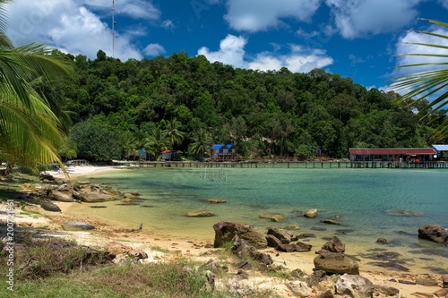 Tropical landscape of fisherman bay with turquoise clean water and pier in the. Koh Rong Samloem. Cambodia, Asia. © stockcrafter