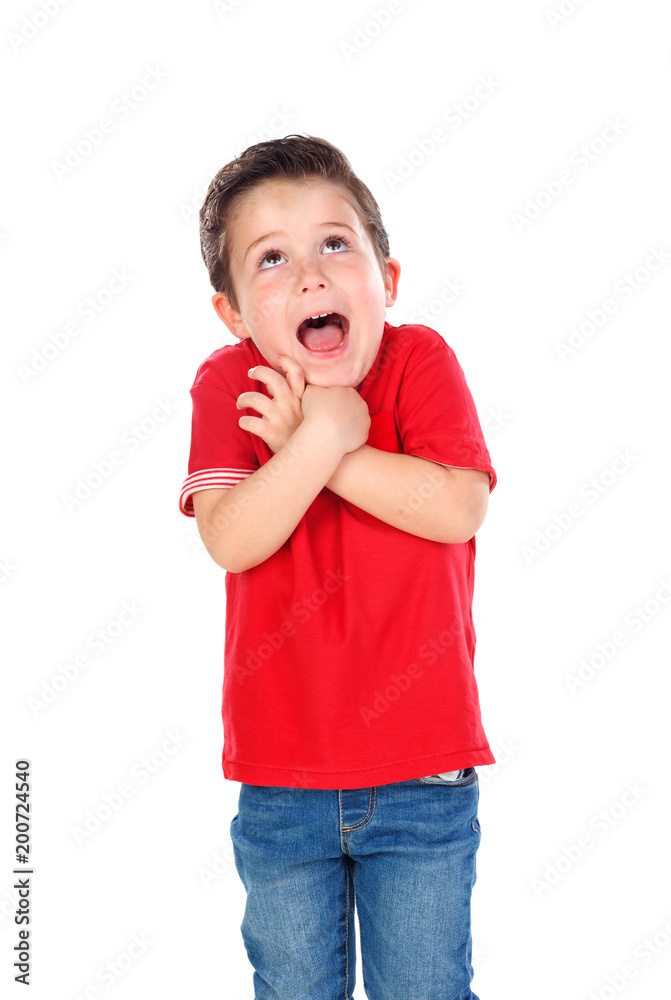 Surprised small boy with red shirt and jeans Surprised small boy with red shirt and jeans
