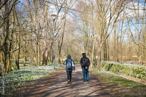 couple walking on path, romantic stroll together © missizio01