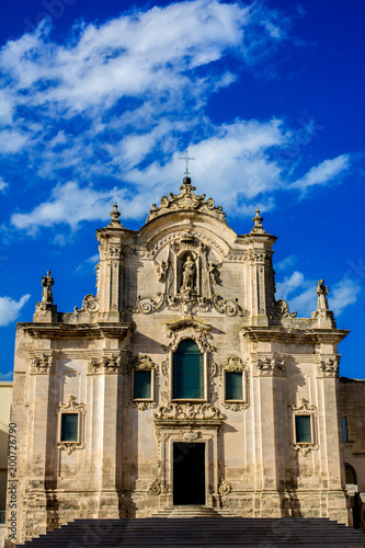 Vertical View of the Church of San Francesco D'assisi on Blue Sky Background. Matera, South of Italy