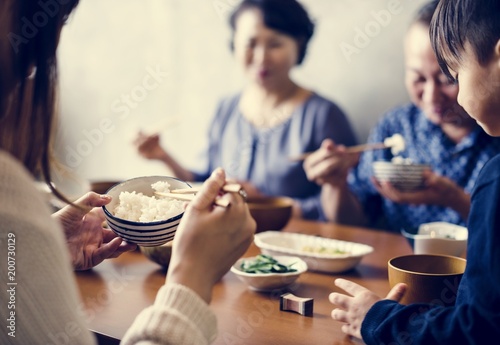 Fotografie Japanese family eating