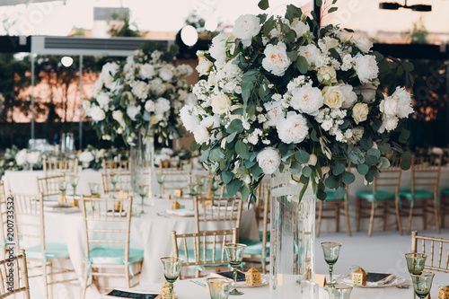Wedding table decor in white green tones © primipil