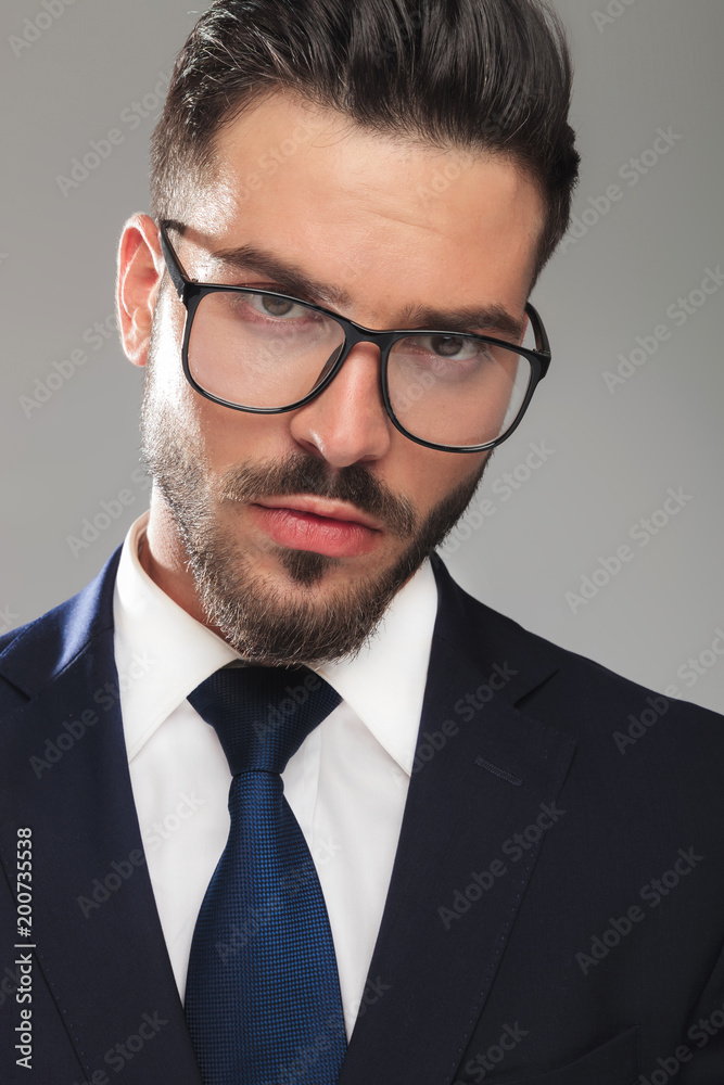 portrait of surprised businessman with eyeglasses portrait of surprised businessman with eyeglasses