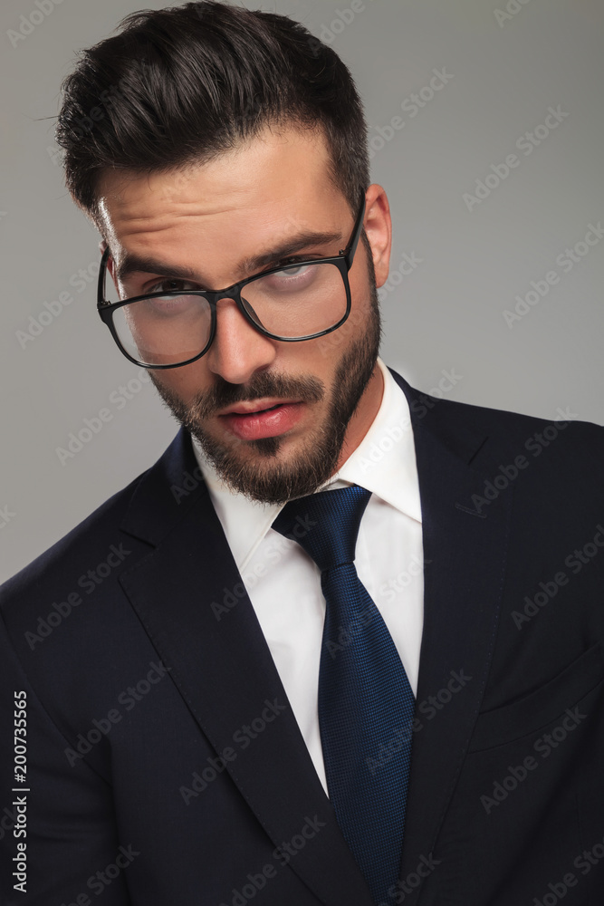 portrait of shocked businessman looking up in disbelief