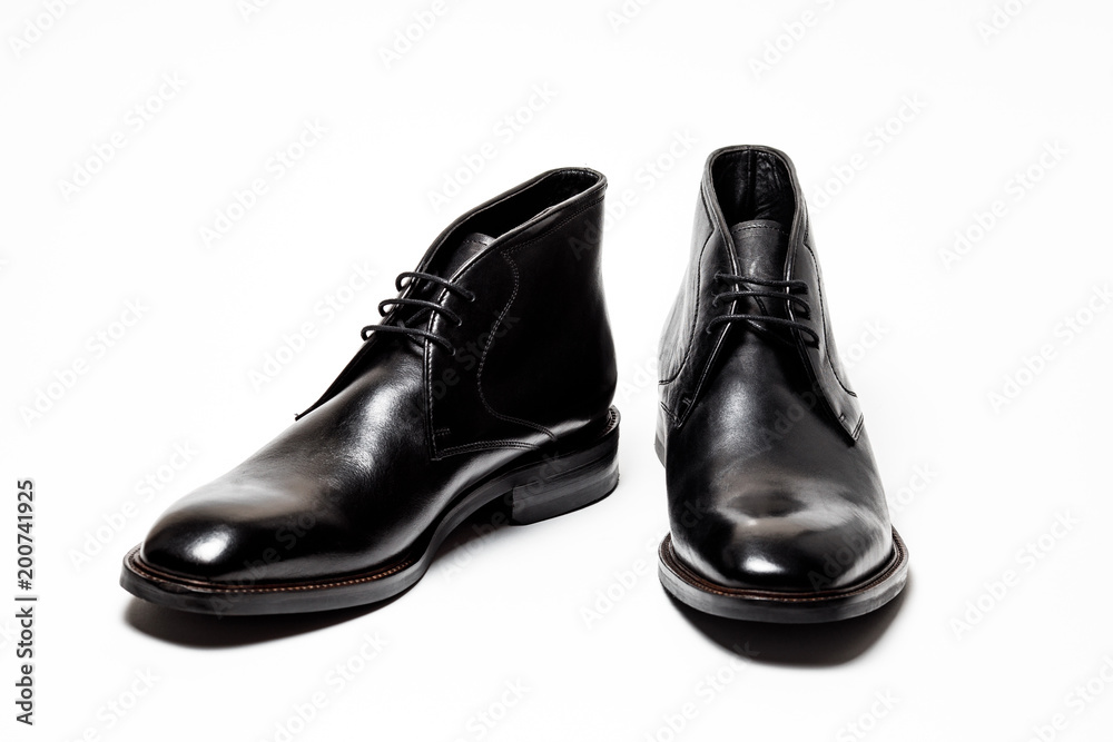 Black leather male shoes, white background Black leather male shoes, white background