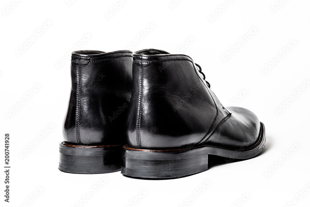 Black leather male shoes, white background Black leather male shoes, white background