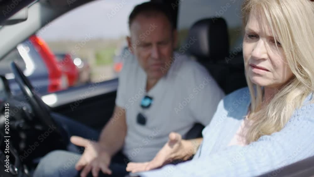 Portrait of upset woman as her partner is annoyed at her Portrait of upset woman as her partner is annoyed at her