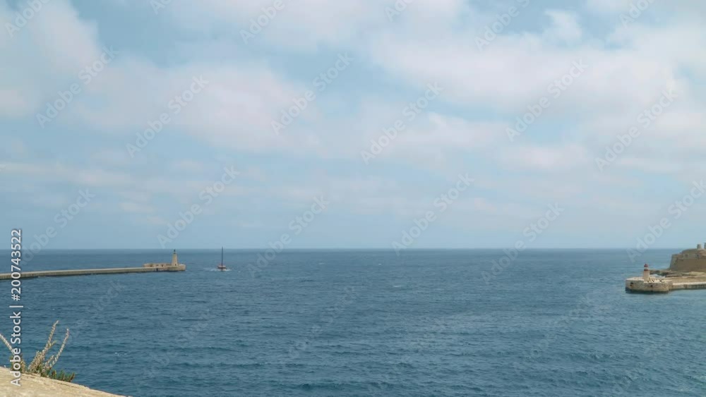 View of the Mediterranean Sea, Fort Ricasoli and the island of Malta from the coast of Valletta. View of the Mediterranean Sea, Fort Ricasoli and the island of Malta from the coast of Valletta.