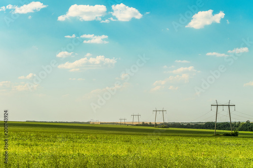 Landscape with air line supports. Intermediate steel overhead transmission line supports on a horizon. © nskyr2