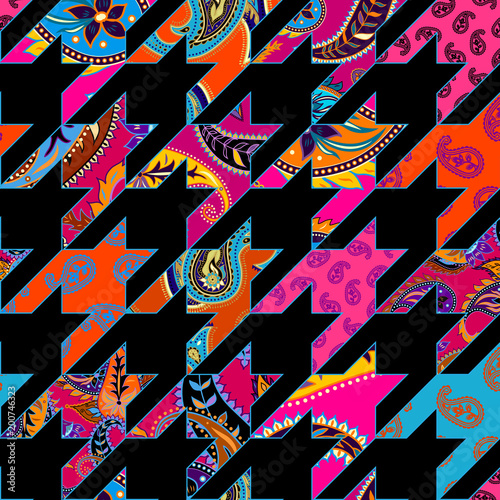 Seamless background pattern. Geometrical Hounds-tooth pattern in a patchwork style.