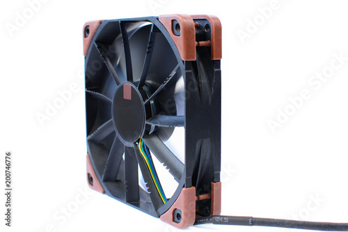 Obraz na płótnie Computer black fan isolated on white background. Quiet cooling component of pc with anti-vabration pads. Hardware cooler in action w salonie