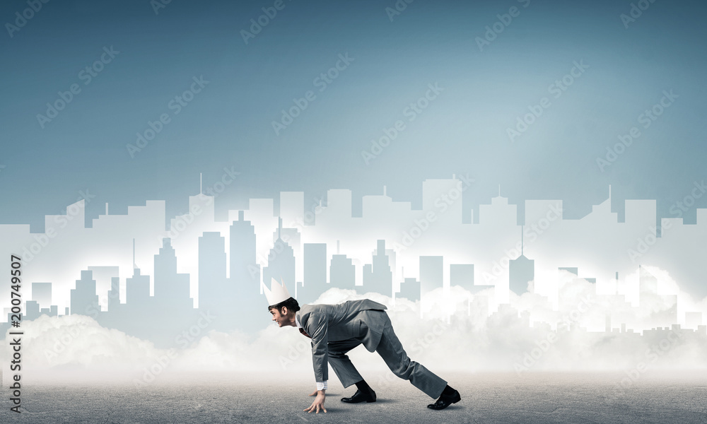 King businessman in elegant suit running and blue cityscape silh