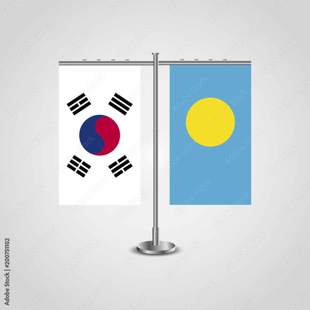Table stand with flags of South Korea and Palau.Two flag. Flag pole. Symbolizing the cooperation between the two countries. Table flags Table stand with flags of South Korea and Palau.Two flag. Flag pole. Symbolizing the cooperation between the two countries. Table flags