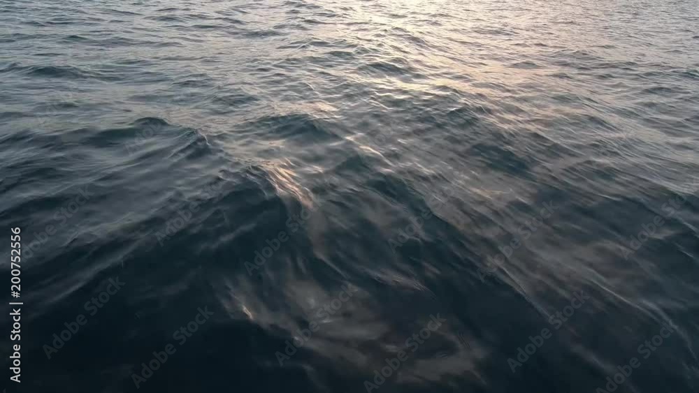 Beautiful deep blue Mediterranean Sea water. Ocean waves. Cruise ship vacation in Europe. Environmental and nature with deep blue sea. Reflection of sky and water ripples. Beautiful deep blue Mediterranean Sea water. Ocean waves. Cruise ship vacation in Europe. Environmental and nature with deep blue sea. Reflection of sky and water ripples.